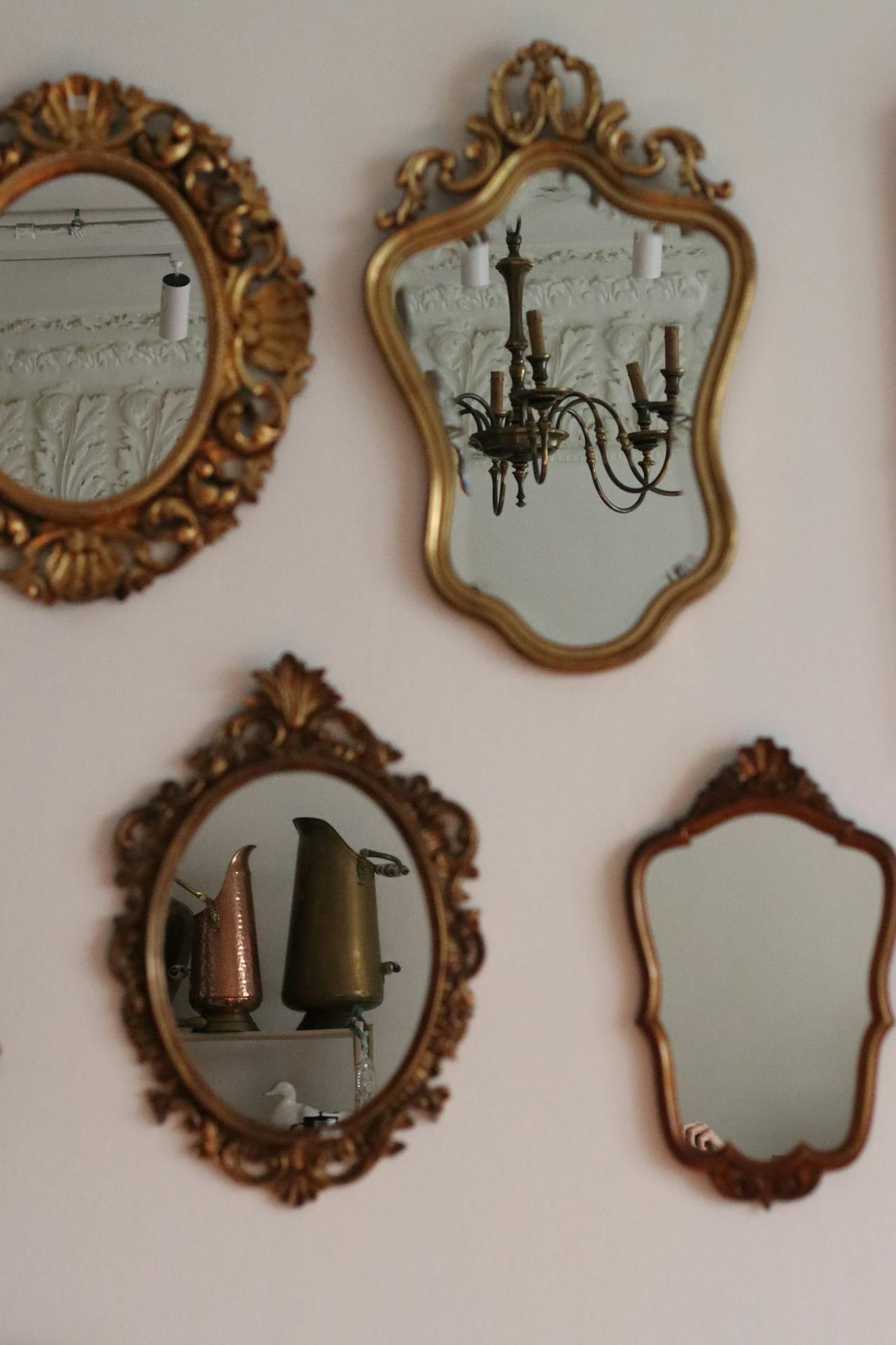 Create A Gallery Wall With Assorted Vintage Mirrors