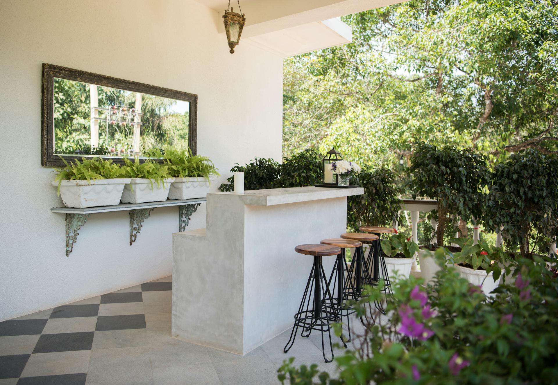 Mount Mirrors On A Garden Wall