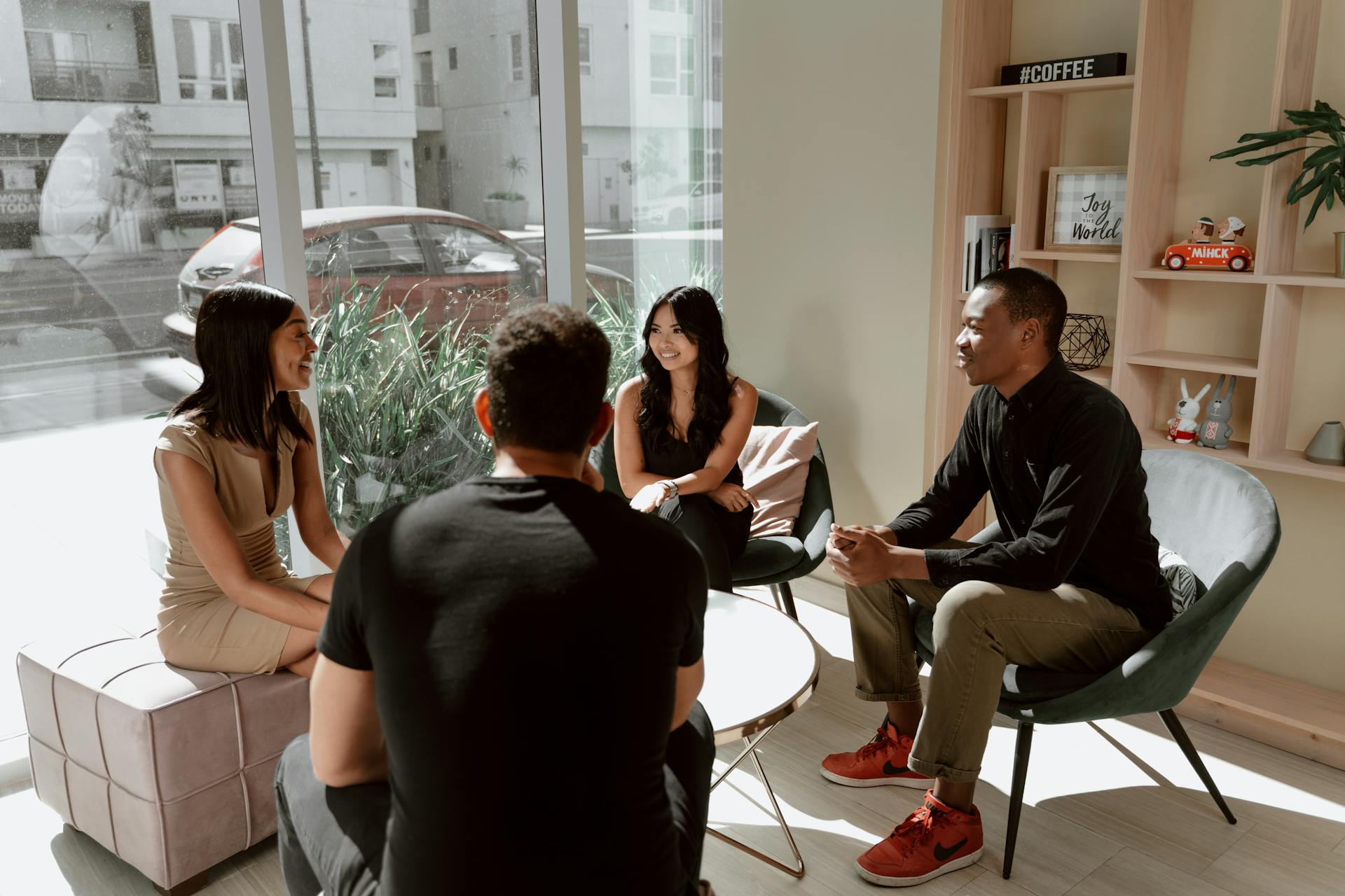 Conversation Circle Around A Coffee Table