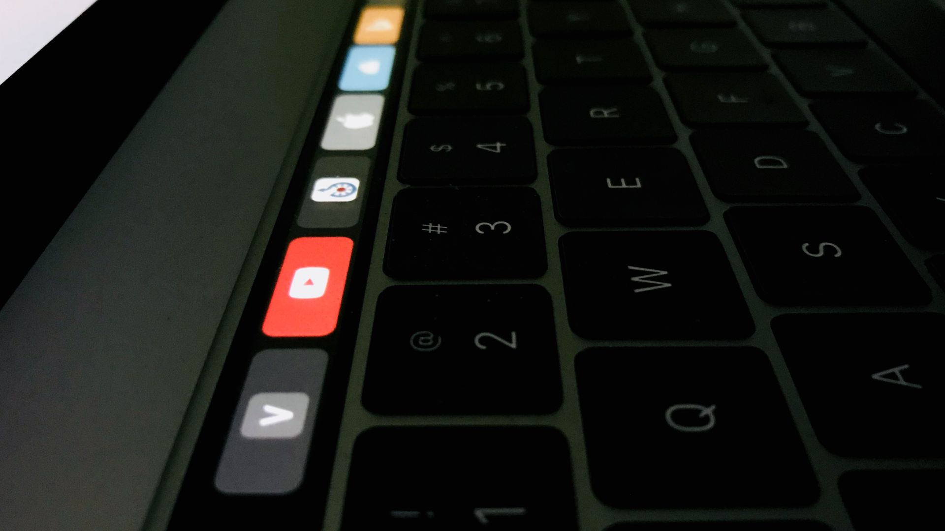 7. La barre tactile du Mac