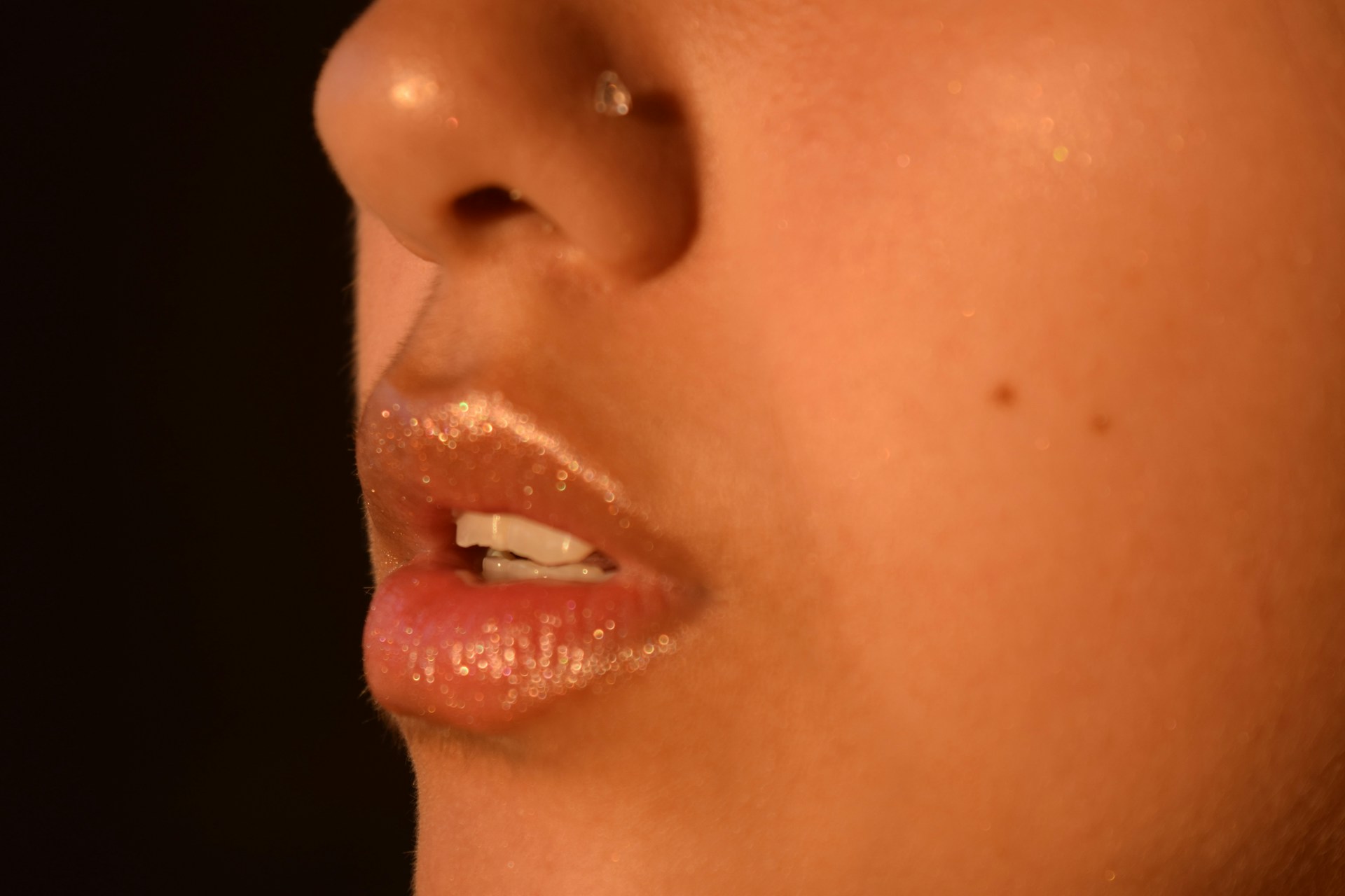 13. Minimalist Nose Studs With a Single Clear Gemstone