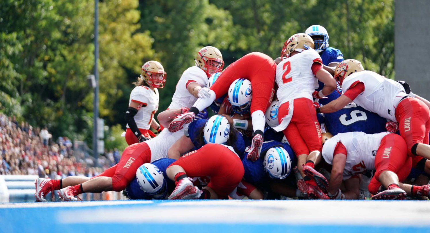 Olivier Cool responds to the Carabins crowd at CEPSUM