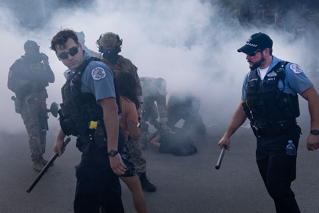 Police Officers Tear-gassed