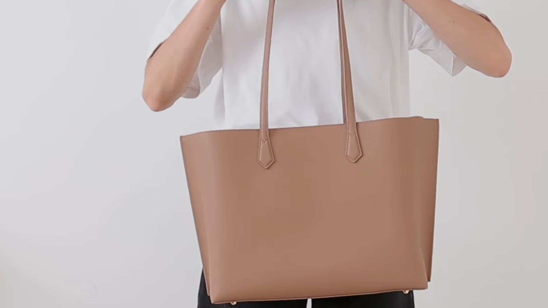 7. Quince Italian Leather Triple Compartment Tote