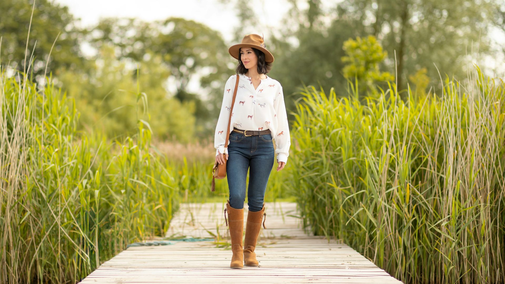 13. Choisir des bottes à hauteur de genou pour les silhouettes élancées