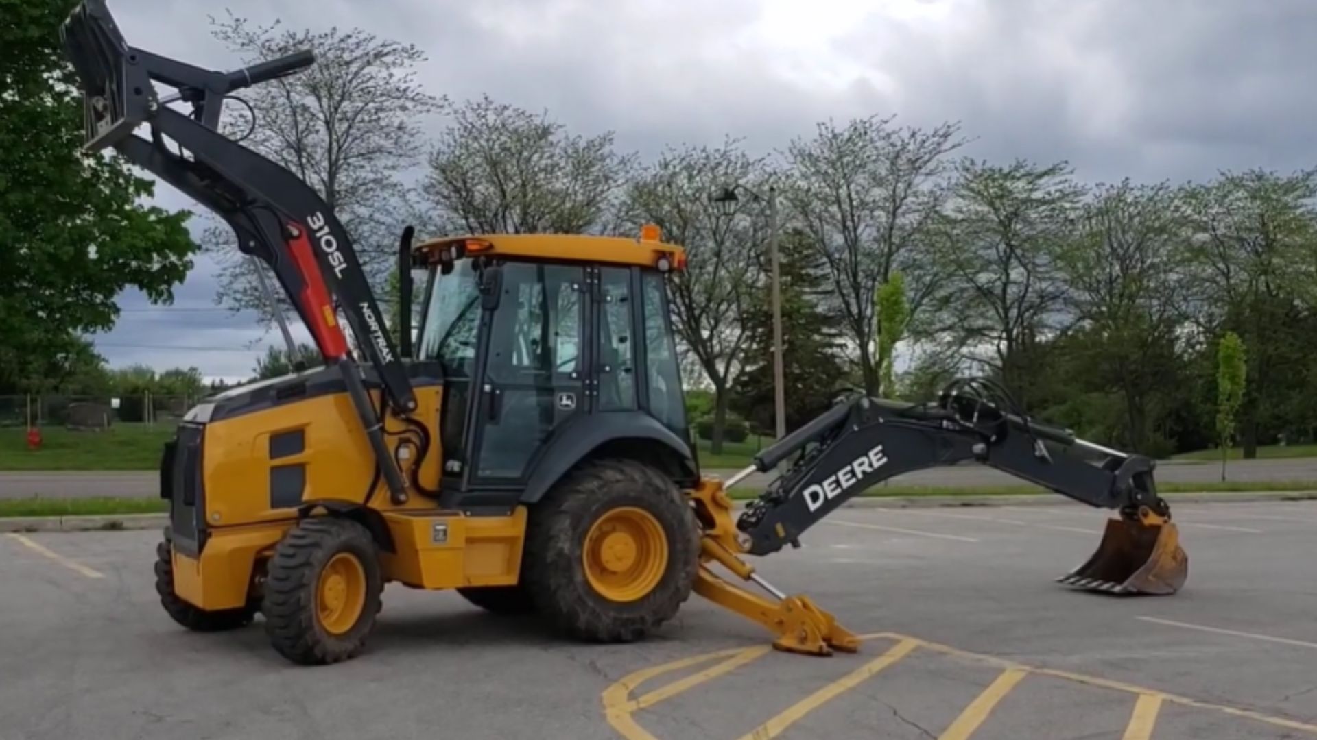 15. Chargeuse-pelleteuse John Deere 310SL HL