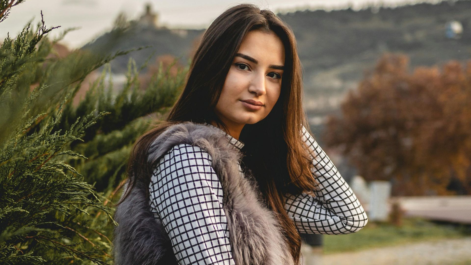 18. Gilet en fausse fourrure sur top thermique et legging