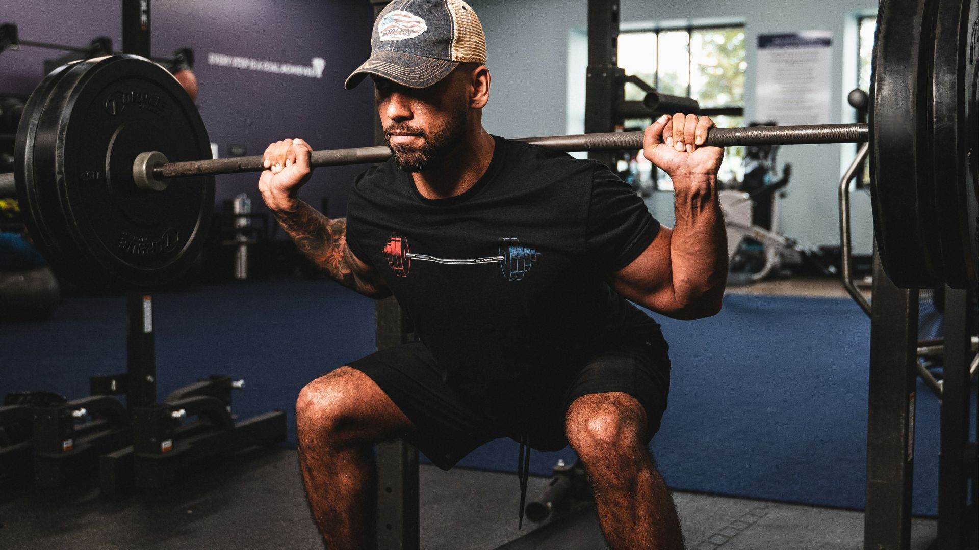 9. Squats sur machine Smith