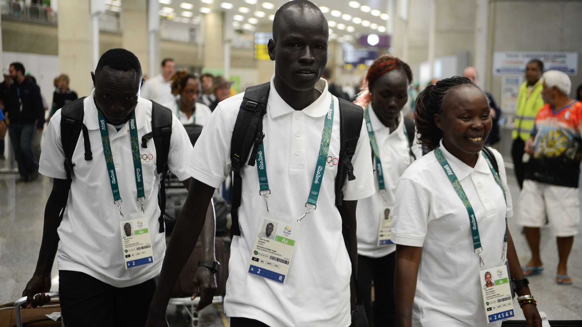 20. Une équipe de réfugiés fait son entrée