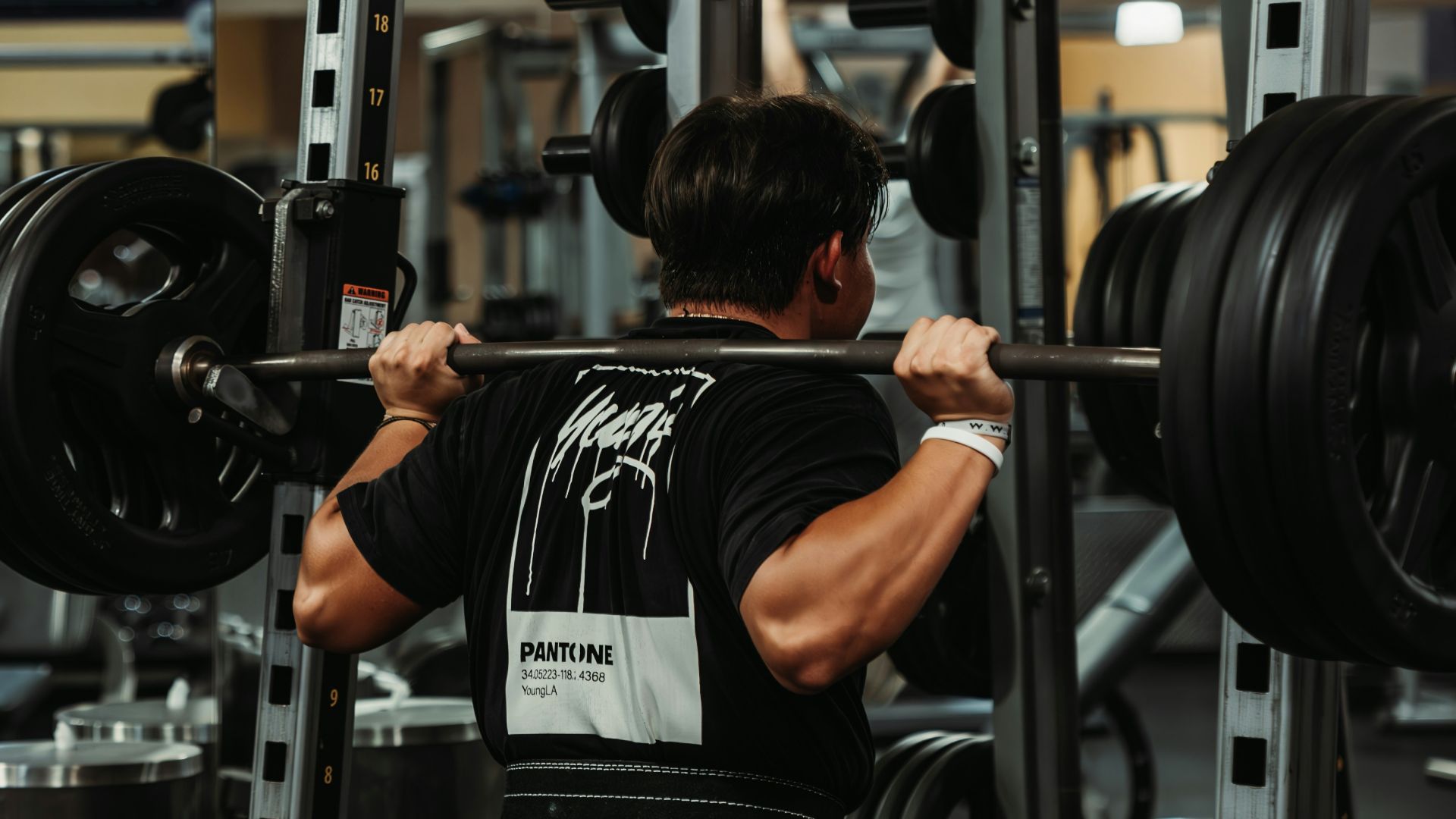 7. Mise en place pour les squats à la machine Smith