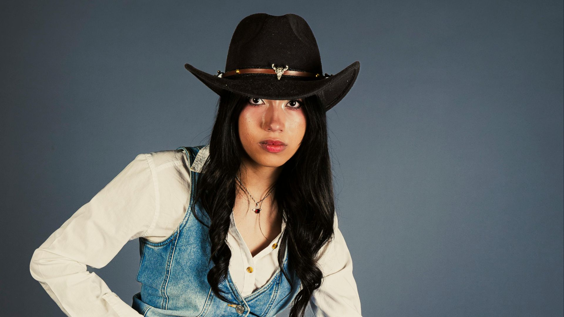 16. La tenue avec bottes western et jean