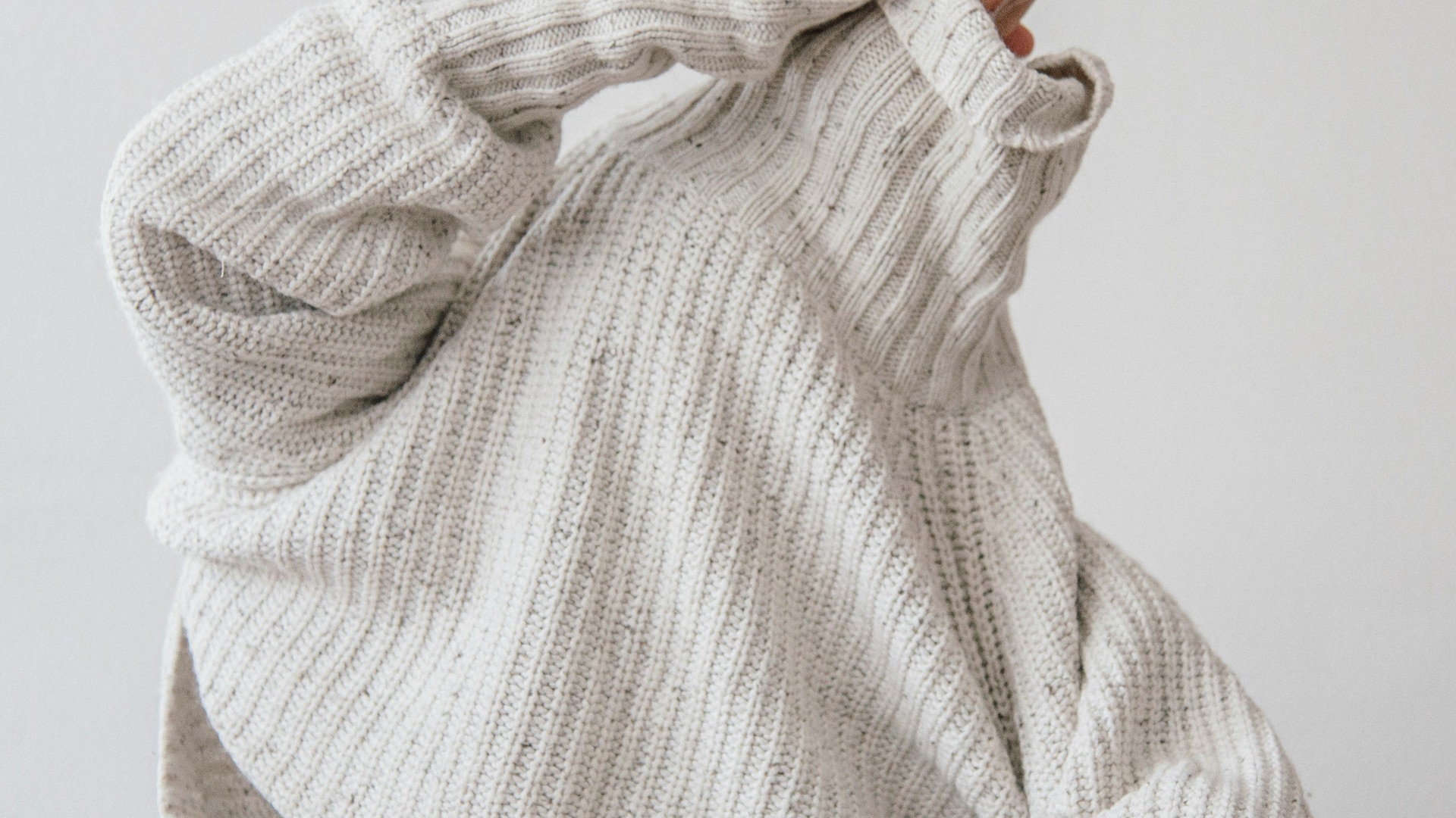7. Des pulls superposés sous les vêtements d'extérieur