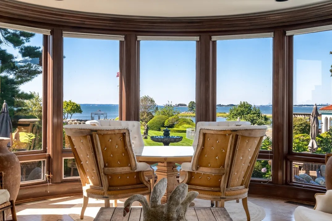 Panoramic living room with a view of the water