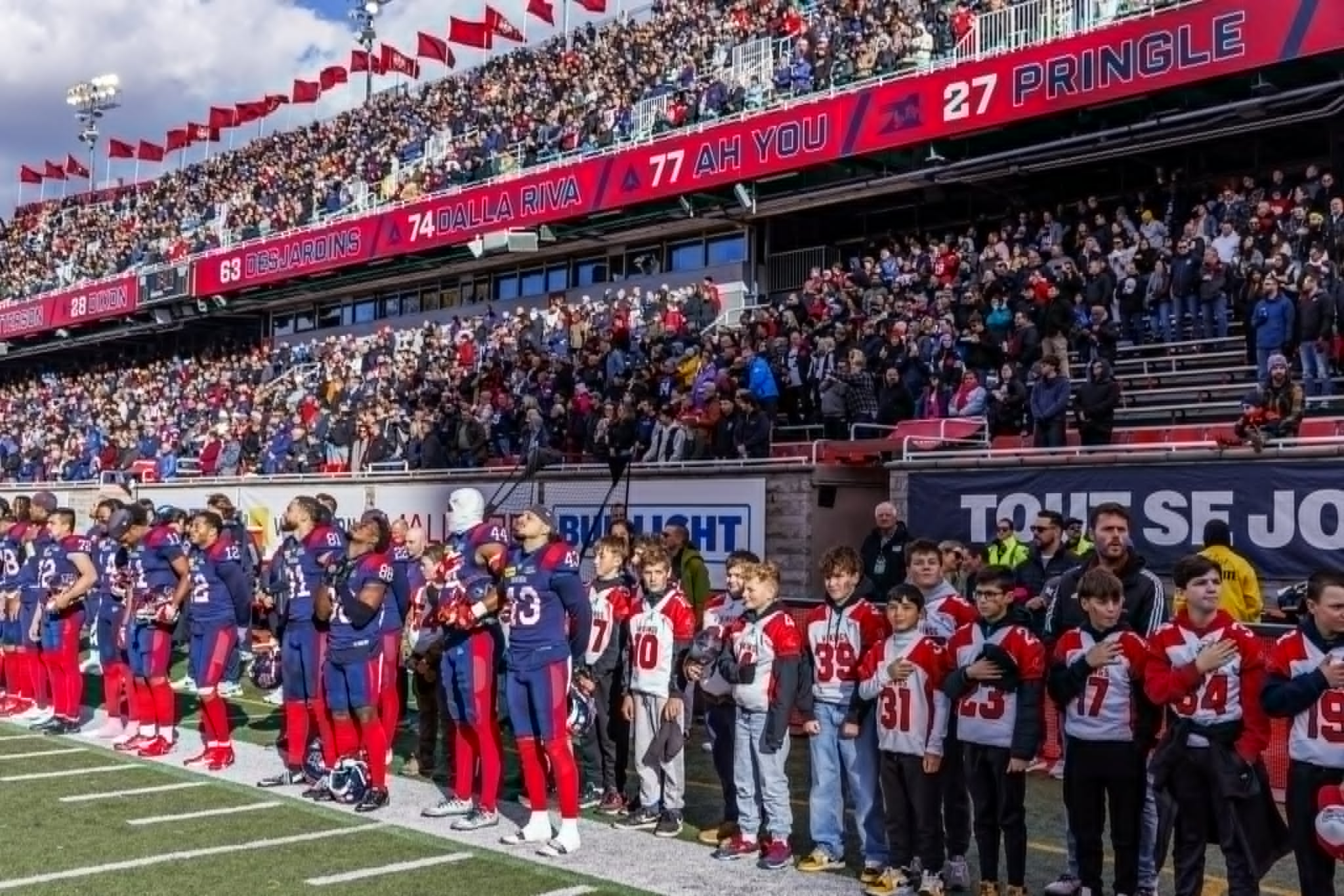 The singer performing the national anthem tonight at the Alouettes game is going to surprise you