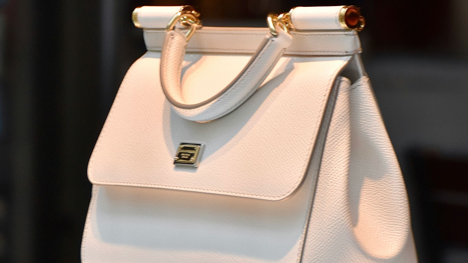 5. Des tenues de sport assorties à la perfection avec des sacs à main de créateurs