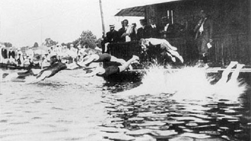 16. Swimmers Scrambled Over Moored Boats In The River Seine
