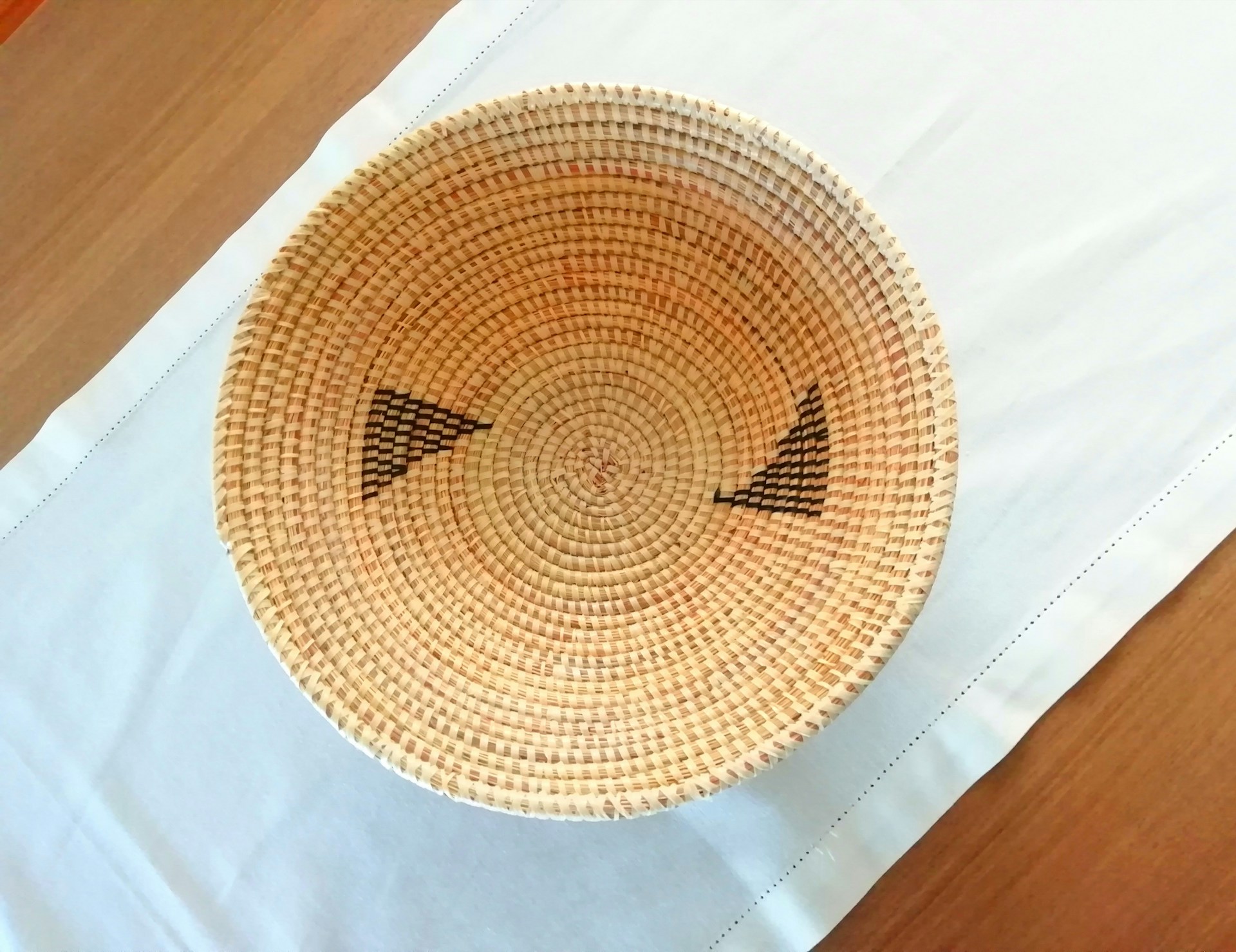 <strong>15. A decorative basket (wicker, seagrass, etc.)</strong>