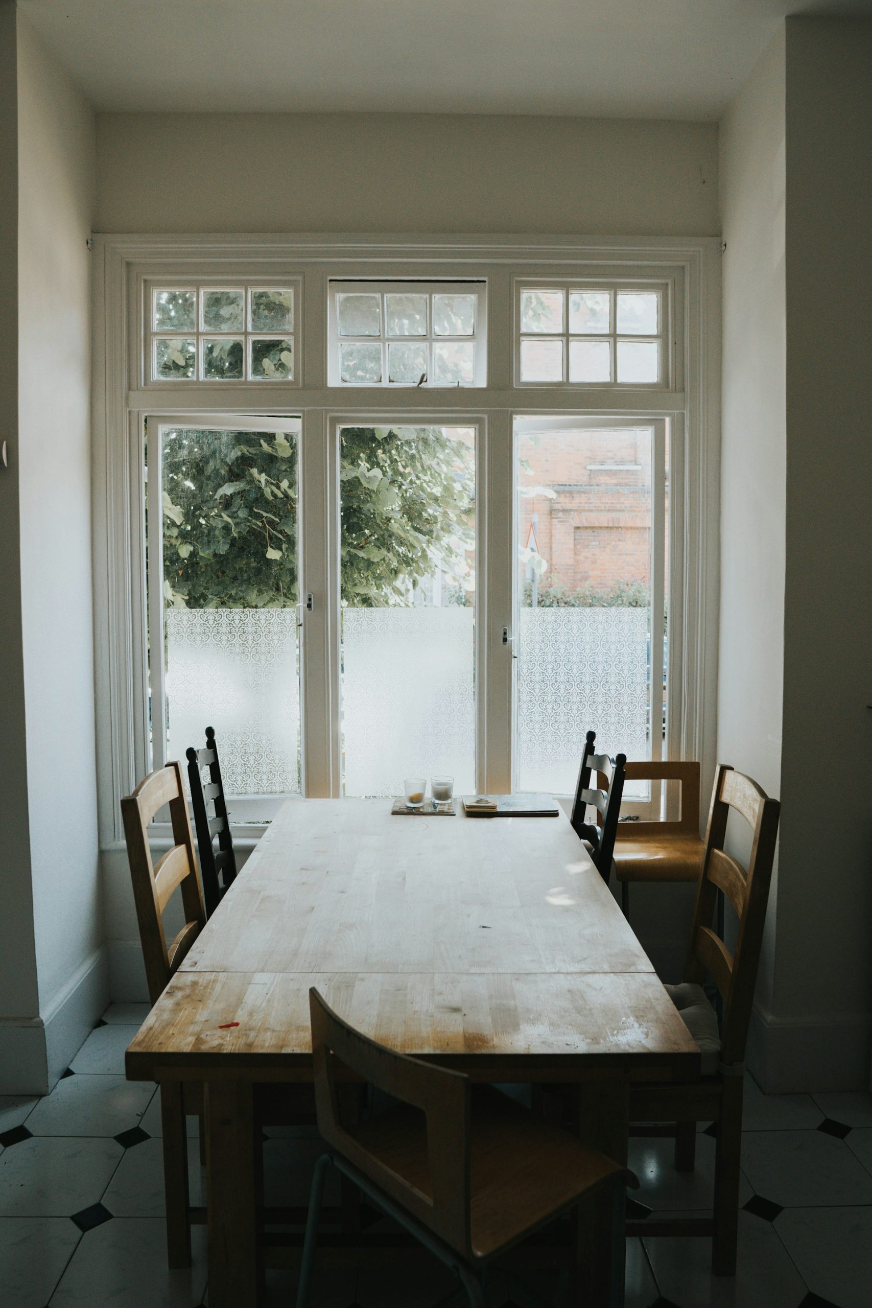 11. The fixed kitchen table in a space that is too large
